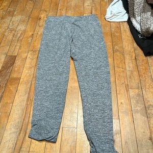 grey cross leggings with butt scrunch.